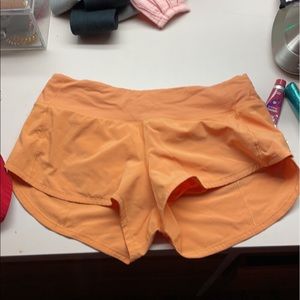 Orange lululemon speed up shorts